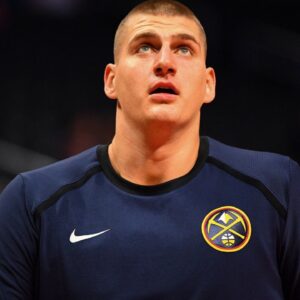 Denver Nuggets Center Nikola Jokic (15) looks on before a NBA Basketball Herren USA preseason game between the Denver Nuggets and the Los Angeles Clippers`