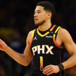 Phoenix Suns guard Devin Booker (1) reacts after a play against the Oklahoma City Thunder during the first half at Footprint Center