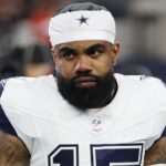 Dallas Cowboys running back Ezekiel Elliott (15) stands on the field before a game against the Cincinnati Bengals at AT&T Stadium.