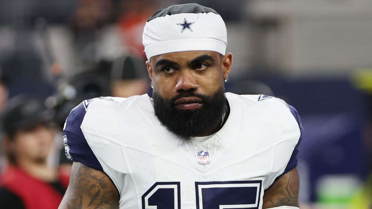Dallas Cowboys running back Ezekiel Elliott (15) stands on the field before a game against the Cincinnati Bengals at AT&T Stadium.