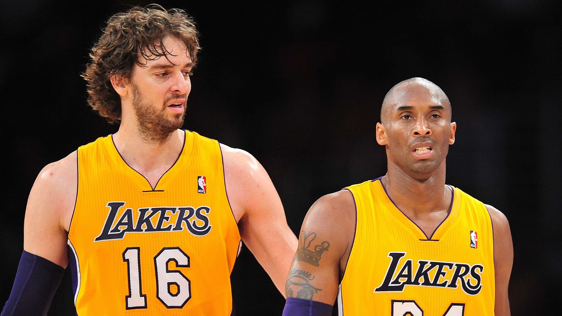 November 27, 2012; Los Angeles, CA, USA; Los Angeles Lakers power forward Pau Gasol (16) and shooting guard Kobe Bryant (24) during a stoppage in play against the Indiana Pacers during the second half at Staples Center.