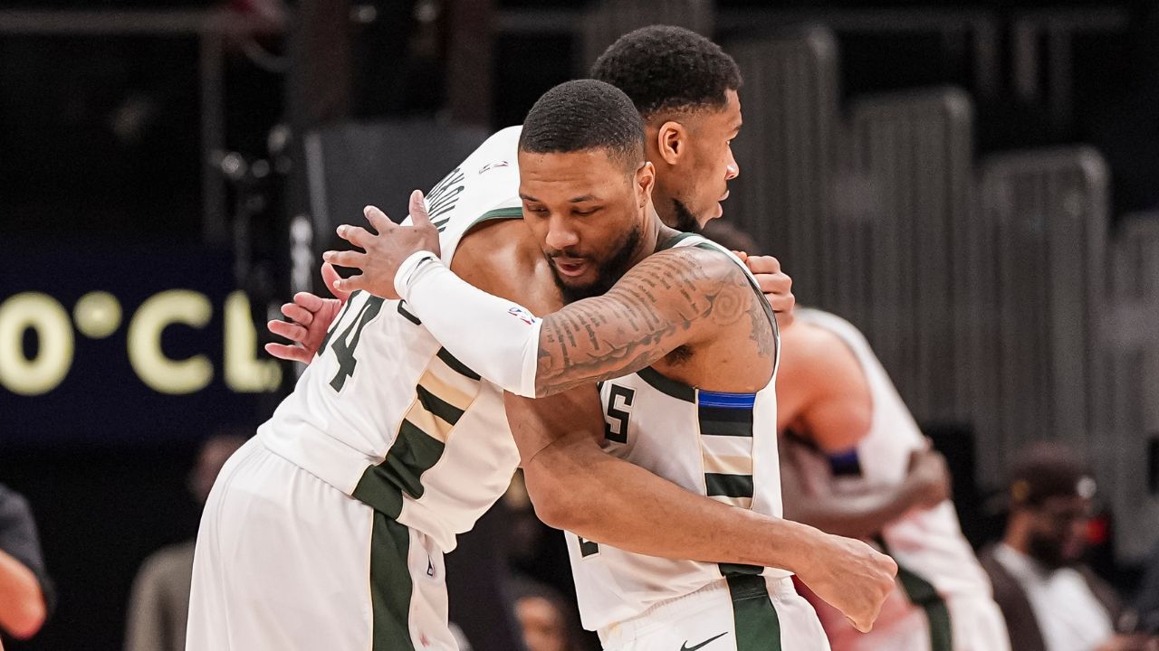 ; Milwaukee Bucks forward Giannis Antetokounmpo (34) and guard Damian Lillard (0) react after defeating the Atlanta Hawks at State Farm Arena