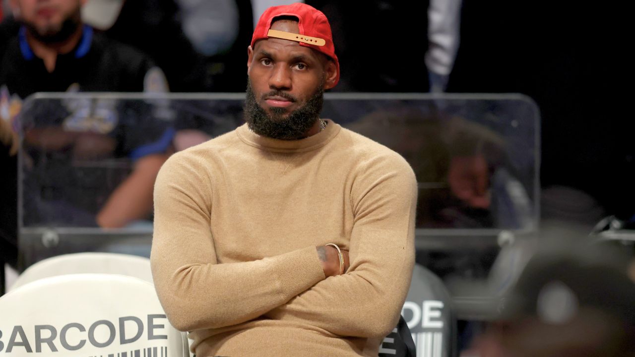 LeBron James watches from the bench