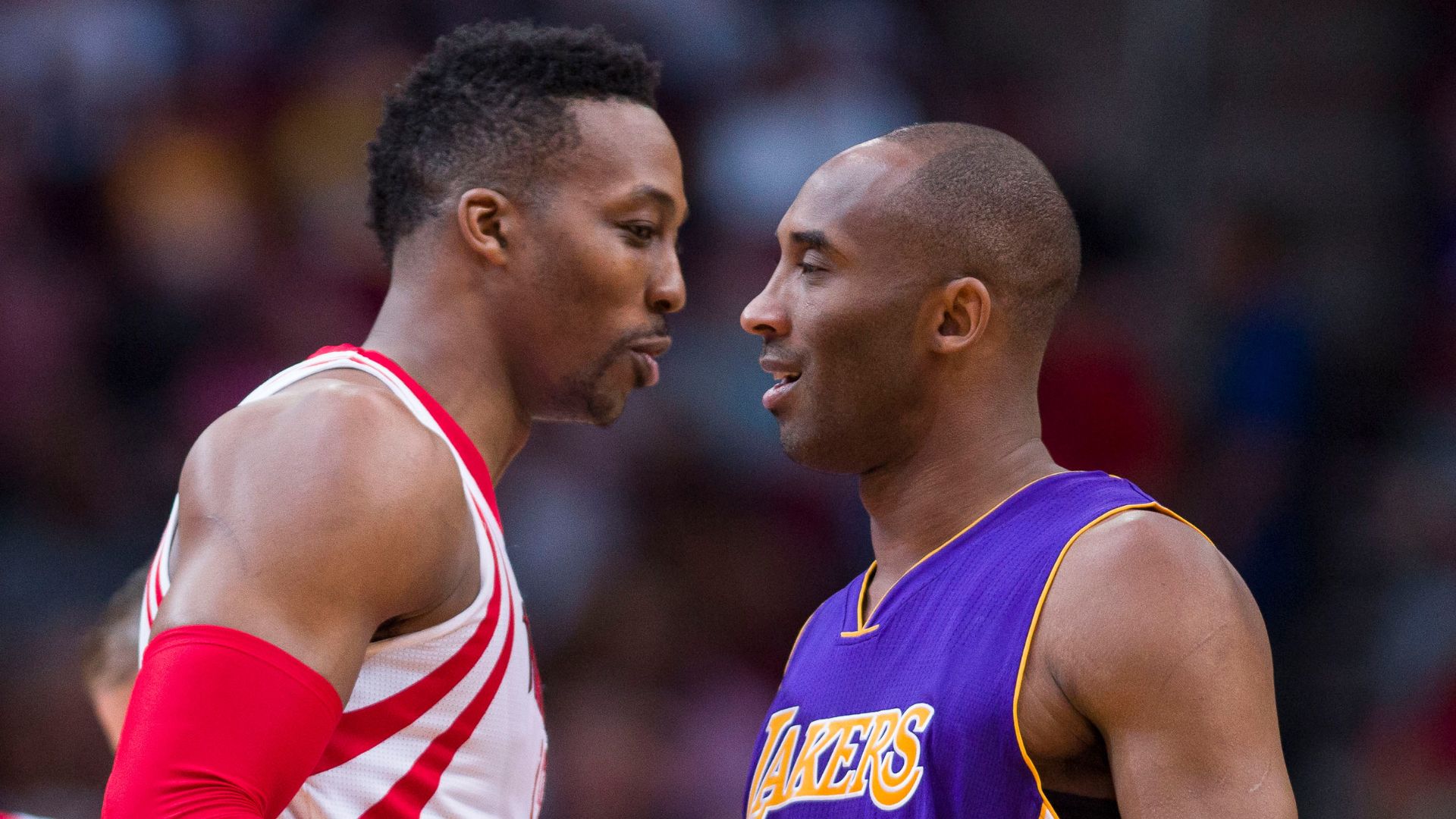 Apr 10, 2016; Houston, TX, USA; Houston Rockets center Dwight Howard (12) and Los Angeles Lakers forward Kobe Bryant (24) meet at center court before the game at the Toyota Center.