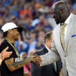 Apr 4, 2016; Houston, TX, USA; Shaquille O'Neal shakes hands with Allen Iverson as they are introduced at halftime of the championship game of the 2016 NCAA Men's Final Four after being inducted into the basketball hall of fame at NRG Stadium.