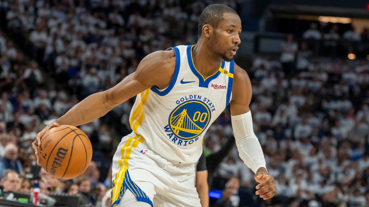 Golden State Warriors forward Jonathan Kuminga (00) dribbles the ball against the Minnesota Timberwolves in the second half during game two of the second round for the 2025 NBA Playoffs at Target Center.