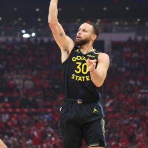 Golden State Warriors guard Stephen Curry (30) shoots the ball during the first quarter of game seven of the first round for the 2025 NBA Playoffs against the Houston Rockets at Toyota Center.