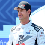 Jul 6, 2024; Chicago, Illinois, USA; Xfinity Series driver Joey Logano (15) before the start of The Loop 121 at the Chicago Street Race. Mandatory Credit: Mike Dinovo-Imagn Images