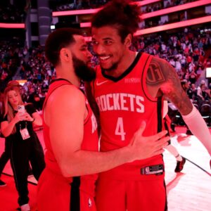 Mar 15, 2025; Houston, Texas, USA; Houston Rockets guard Fred VanVleet (5) congratulates guard Jalen Green (4) following the game against the Chicago Bulls at Toyota Center.