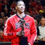 Chicago Bulls point guard Derrick Rose (1) is presented the MVP trophy before game one of the second round of the 2011 NBA playoffs against the Atlanta Hawks at the United Center.