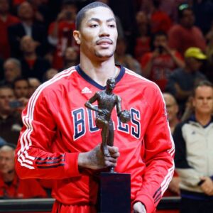 Chicago Bulls point guard Derrick Rose (1) is presented the MVP trophy before game one of the second round of the 2011 NBA playoffs against the Atlanta Hawks at the United Center.