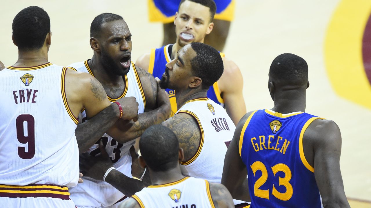 Cleveland Cavaliers forward LeBron James (23) exchanges words with Golden State Warriors forward Draymond Green (23) during the fourth quarter in game four of the NBA Finals at Quicken Loans Arena. The Warriors won 108-97.