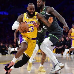 Los Angeles Lakers forward LeBron James (23) moves to the basket against Minnesota Timberwolves forward Julius Randle (30) during the first half in game five of first round for the 2025 NBA Playoffs at Crypto.com Arena.