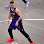 Apr 9, 2025; Dallas, Texas, USA; Los Angeles Lakers guard Luka Doncic (77) celebrates after making a basket Dallas Mavericks during the fourth quarter at the American Airlines Center.