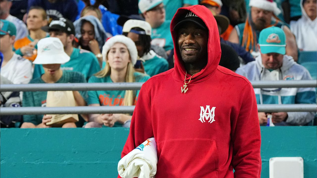 Los Angeles Clippers guard John Wall watches the game between the Miami Dolphins and the Dallas Cowboys during the first half at Hard Rock Stadium.