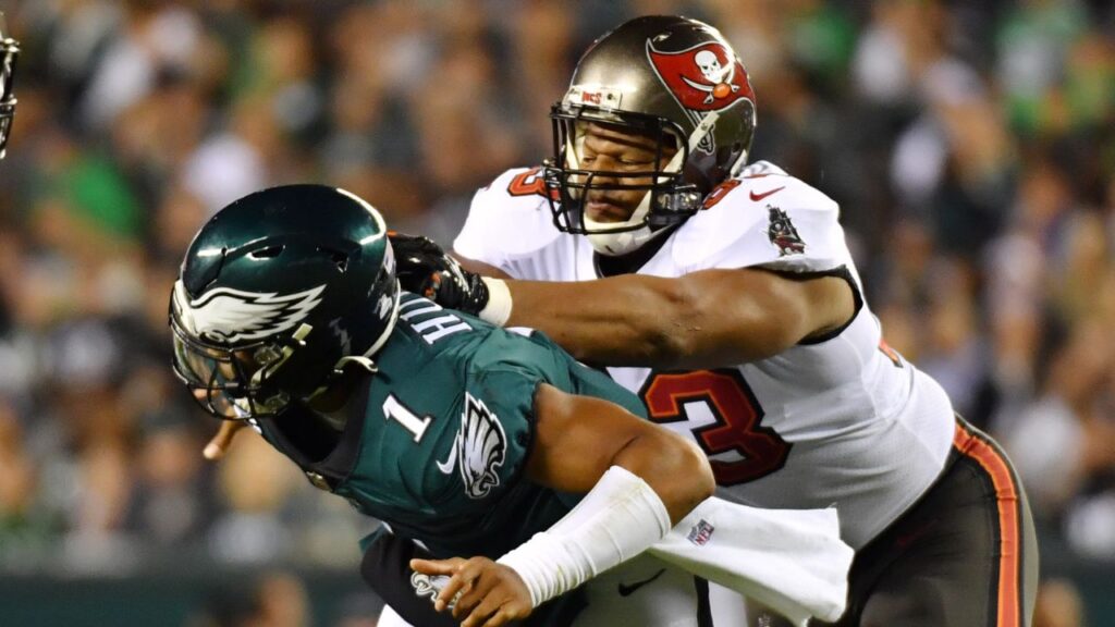 Jalen Hurts and Ndamukong Suh