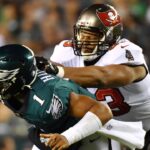 Jalen Hurts and Ndamukong Suh