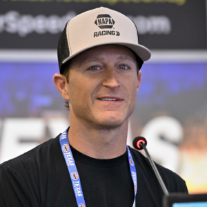 May 4, 2025; Fort Worth, Texas, USA; Driver Kasey Kahne speaks to the media before the start of the Wurth 400 race at Texas Motor Speedway. Mandatory Credit: Jerome Miron-Imagn Images