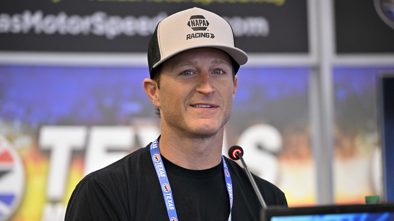 May 4, 2025; Fort Worth, Texas, USA; Driver Kasey Kahne speaks to the media before the start of the Wurth 400 race at Texas Motor Speedway. Mandatory Credit: Jerome Miron-Imagn Images