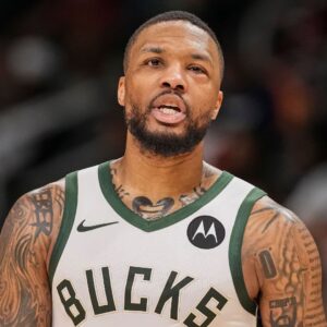Mar 4, 2025; Atlanta, Georgia, USA; Milwaukee Bucks guard Damian Lillard (0) shown with his eye swollen after being injured earlier in the game against the Atlanta Hawks during the second half at State Farm Arena.
