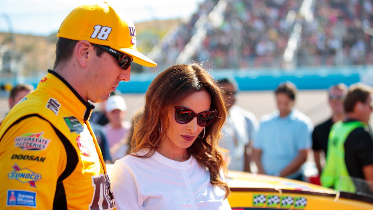 NASCAR Cup Series driver Kyle Busch (left) and wife Samantha Busch during the Bluegreen Vacations 500 at ISM Raceway.