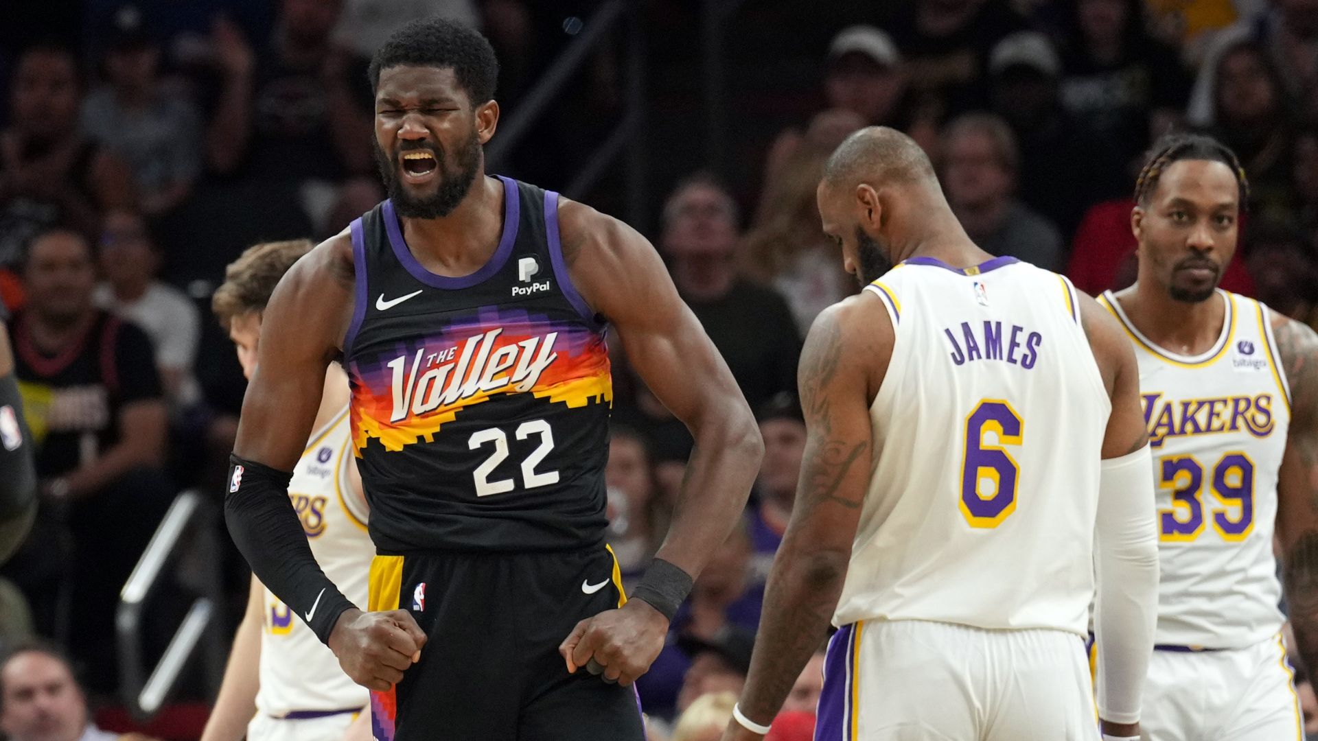 Mar 13, 2022; Phoenix, Arizona, USA; Phoenix Suns center Deandre Ayton (22) reacts after making a basket against the Los Angeles Lakers during the second half at Footprint Center