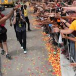 Cleveland Cavaliers Kyrie Irving celebrates with the crowd in downtown Cleveland Cleveland Cavaliers Kyrie Irving celebrates with the crowd during a parade to celebrate winning the 2016 NBA Championship in downtown Cleveland, Ohio.