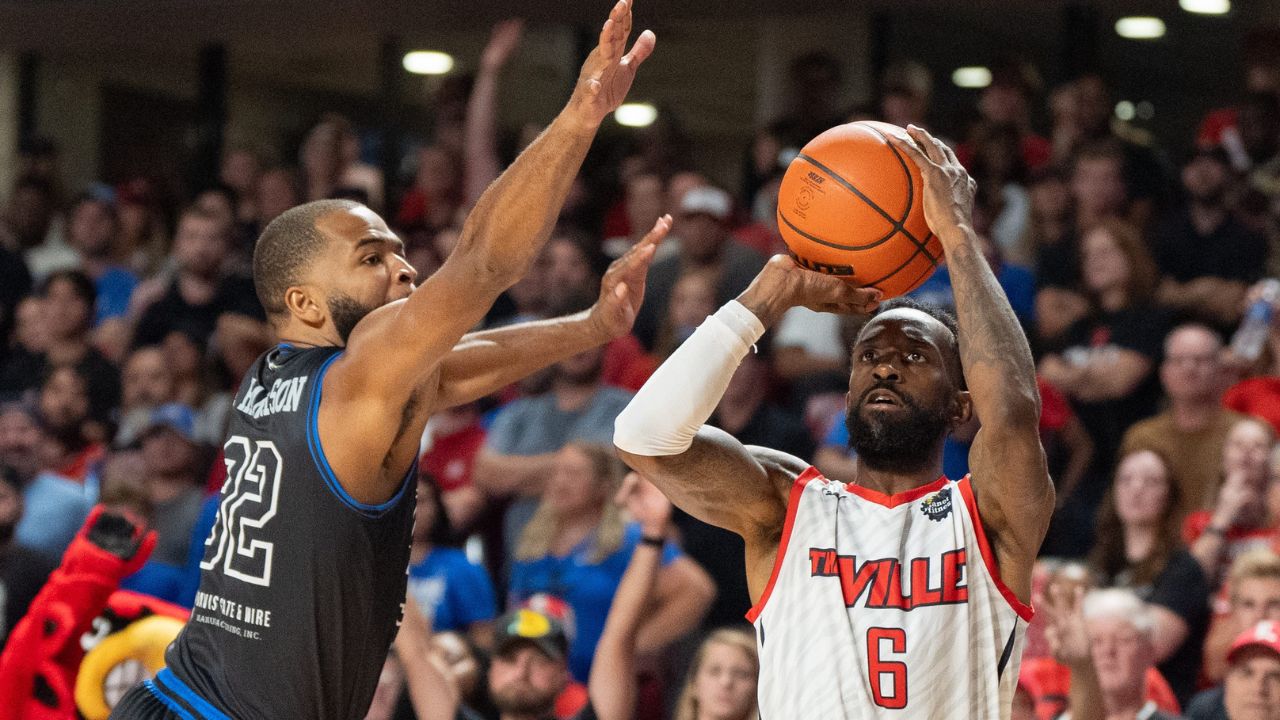 The Ville's Russ Smith (6) goes for a three pointer against La Familia's Aaron Harrison (32) during their game on Monday, July 29, 2024 at Freedom Hall in Louisville, Ky. during the quarter finals of The Basketball Tournament.