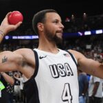 USA guard Steph Curry (4) throws a ball to the fans after defeating Canada in the USA Basketball Showcase at T-Mobile Arena.