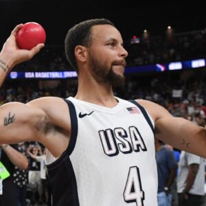 USA guard Steph Curry (4) throws a ball to the fans after defeating Canada in the USA Basketball Showcase at T-Mobile Arena.