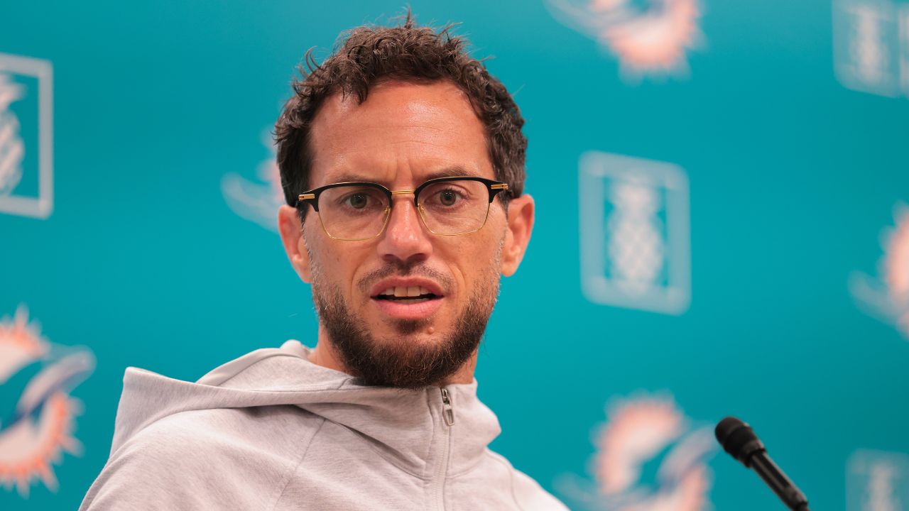 Miami Dolphins head coach Mike McDaniel talks to reporters before practice during mandatory minicamp at Hard Rock Stadium.