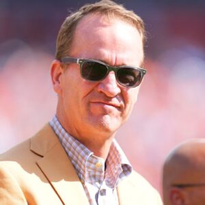 American former football player Peyton Manning before the game against the Las Vegas Raiders at Empower Field at Mile High.