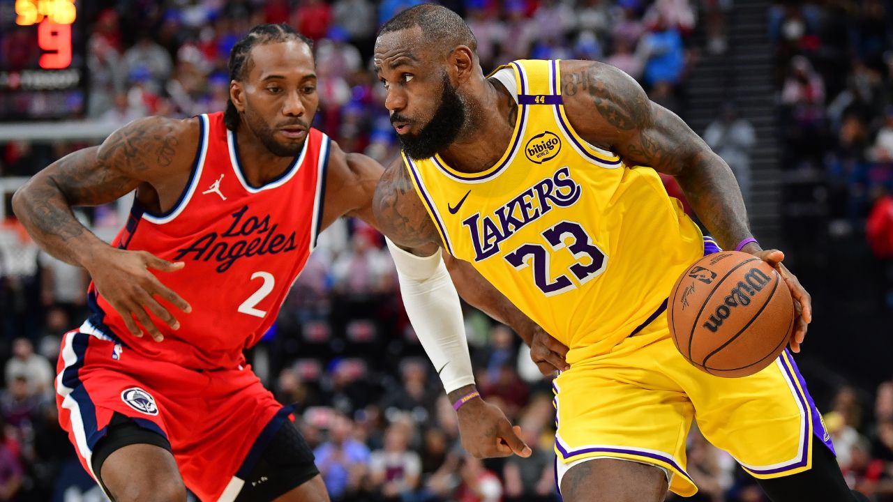 Los Angeles Lakers forward LeBron James (23) moves the ball against Los Angeles Clippers forward Kawhi Leonard (2) during the second half at Intuit Dome.