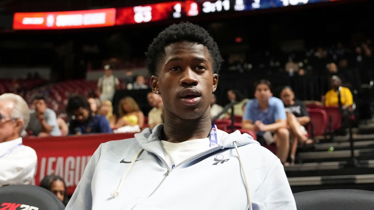 Philadelphia 76ers guard VJ Edgecombe (77) watches the game against the San Antonio Spurs from the baseline at Thomas & Mack Center.