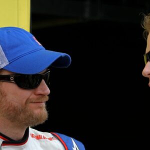 NASCAR Sprint Cup Series driver Dale Earnhardt Jr (left) talks to Brad Keselowski during the Subway Fresh Fit 500 at Phoenix International Raceway.