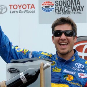 NASCAR Sprint Cup Series driver Martin Truex Jr. (56) celebrates after winning the Toyota/Save Mart 350 at Sonoma Raceway.
