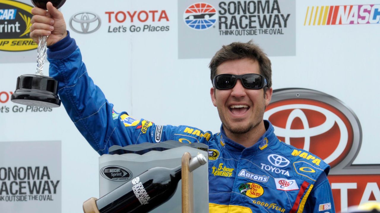 NASCAR Sprint Cup Series driver Martin Truex Jr. (56) celebrates after winning the Toyota/Save Mart 350 at Sonoma Raceway.
