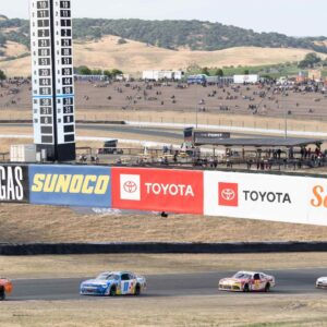 Cars are held in line with a caution flag during the NASCAR Xfinity Series DoorDash 250 at Sonoma Raceway.