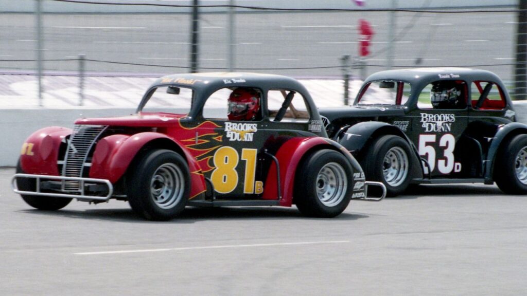 Kix Brooks (81) takes the lead over Ronnie Dunn (53) during a practice run for their upcoming twice-a-month Legend Cars racing series at the Nashville Speedway USA track on May 8, 1995.