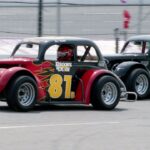 Kix Brooks (81) takes the lead over Ronnie Dunn (53) during a practice run for their upcoming twice-a-month Legend Cars racing series at the Nashville Speedway USA track on May 8, 1995.