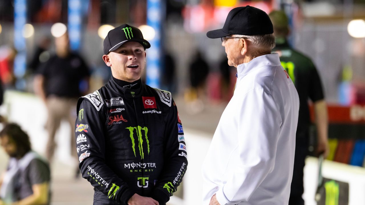 NASCAR Cup Series driver Ty Gibbs (left) with team owner and grandfather Joe Gibbs during qualifying for the Daytona 500 at Daytona International Speedway.