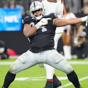 Las Vegas Raiders defensive tackle Christian Wilkins (94) celebrates after a penalty overturned a scoring play by the Cleveland Browns during the fourth quarter at Allegiant Stadium.