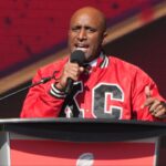 Kansas City mayor Quinton Lucas addresses the crowd on stage during the celebration of the Kansas City Chiefs winning Super Bowl LVIII.
