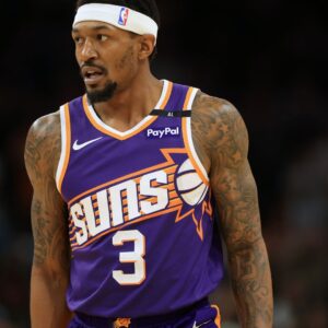 Apr 8, 2025; Phoenix, Arizona, USA; Phoenix Suns guard Bradley Beal (3) reacts during the first half against the Golden State Warriors at Footprint Center.