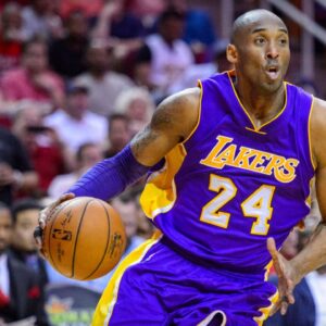 Los Angeles Lakers forward Kobe Bryant (24) and Houston Rockets forward Trevor Ariza (1) in action during the game between the Rockets and the Lakers at the Toyota Center. Bryant plays in the last road game and second to last game of his NBA career.