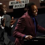 Class of 2021 inductee Paul Pierce speaks alongside presenter Kevin Garnett during the Naismith Memorial Basketball Hall of Fame Enshrinement at MassMutual Center.