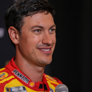 Joey Logano speaks to media members during the NASCAR Playoffs Media Day at the Charlotte Convention Center.