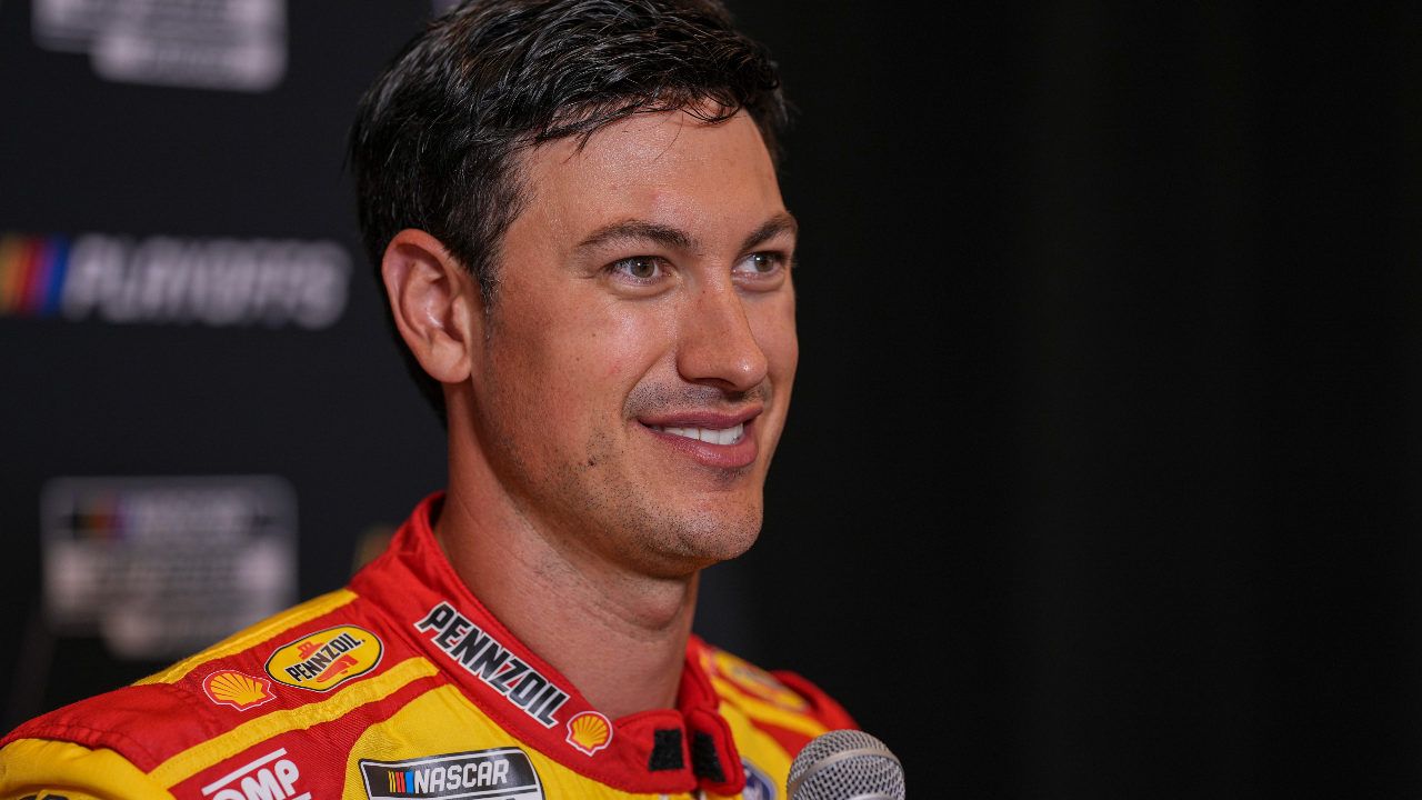 Joey Logano speaks to media members during the NASCAR Playoffs Media Day at the Charlotte Convention Center.