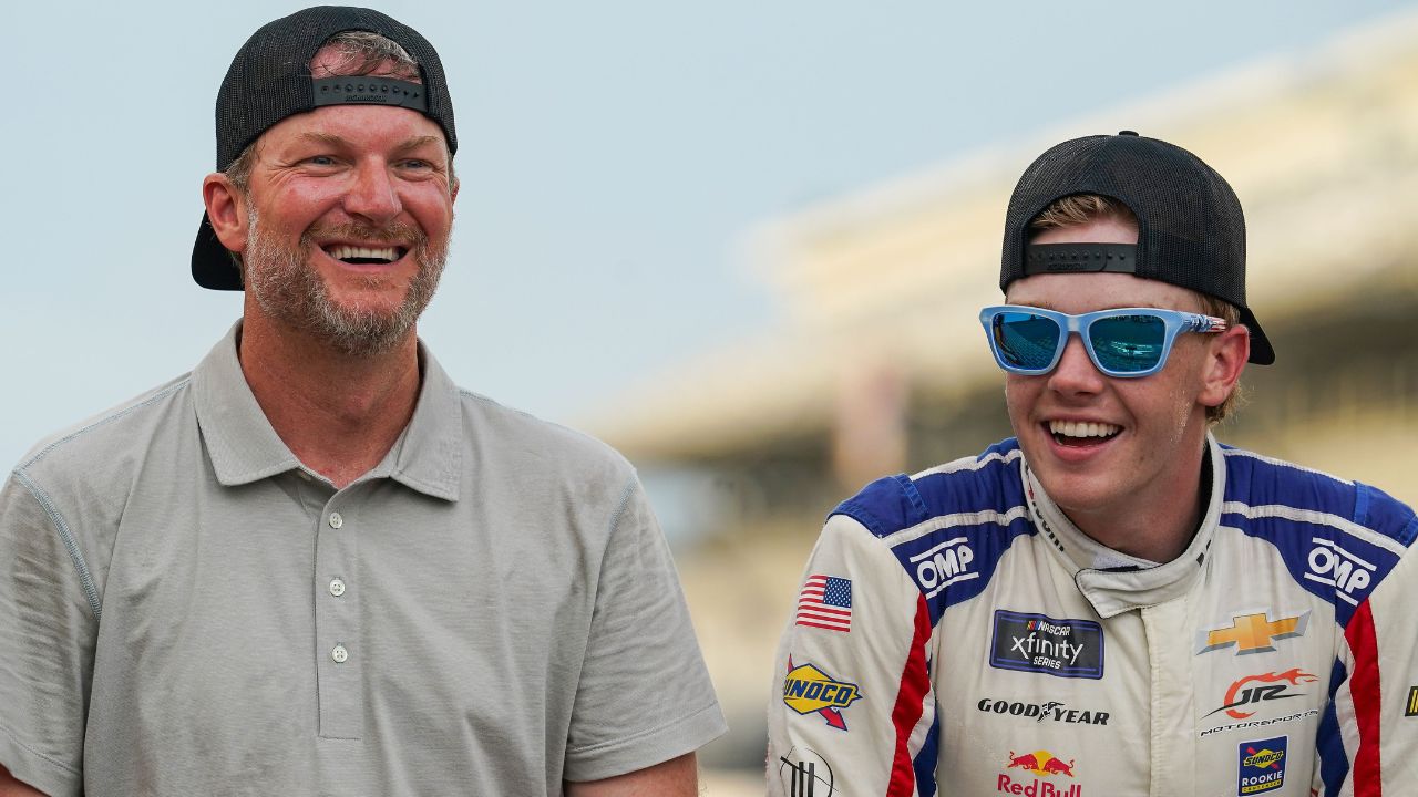Dale Earnhardt Jr. smiles for a photo with NASCAR Xfinity Series driver Connor Zilisch (88) on Saturday, July 26, 2025, after winning the Pennzoil 250 at Indianapolis Motor Speedway.