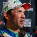 Daniel Suarez speaks to media members during the NASCAR Playoffs Media Day at the Charlotte Convention Center.